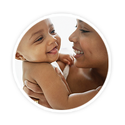 smiling baby and mom